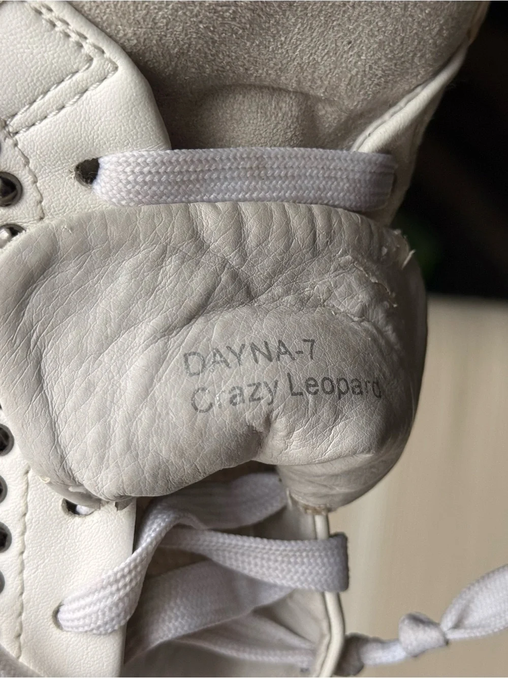 White Leather Women's Sneaker with Leopard Accent and Stud Detailing